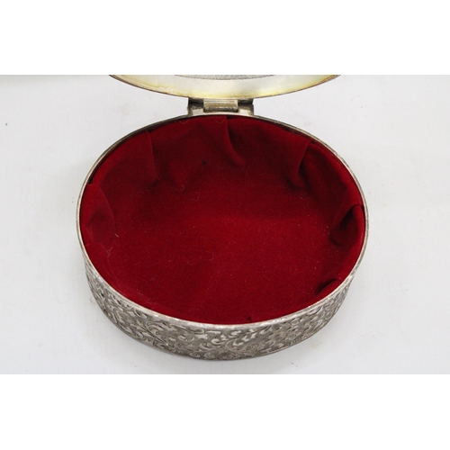 247 - A LARGE VINTAGE SILVER PLATED OVAL REPOUSSE JEWELLERY CASKET