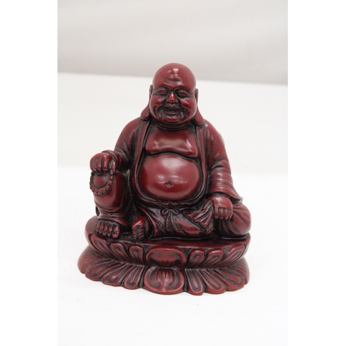 253 - A FIGURE OF A LAUGHING RED BUDDAH