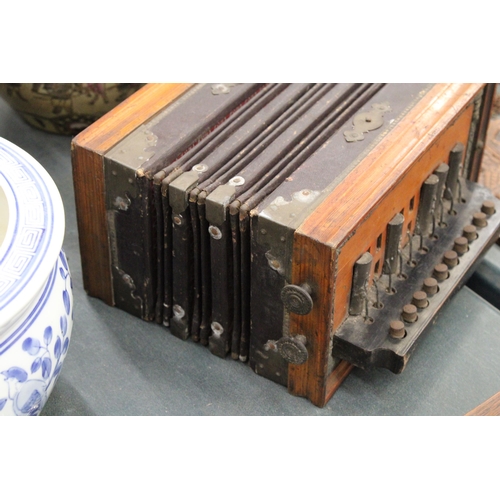 261 - A VINTAGE (POSSIBLY GERMAN) ACCORDIAN/ SQUEEZE BOX