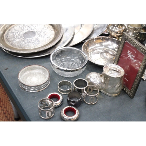 291 - A LARGE QUANTITY OF SILVER PLATED ITEMS TO INCLUDE TRAYS, CANDLEABRAS, TWO CONDIMENT SETS WITH GLASS... 