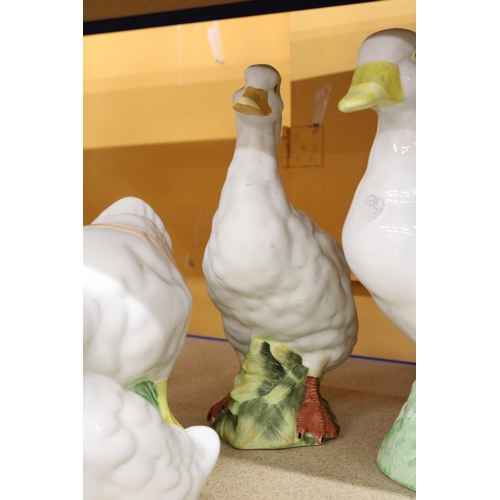 370 - FIVE CERAMIC DUCK FIGURES