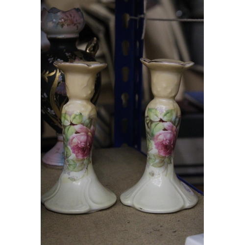 394 - TWO GERMAN FAIRINGS TOGETHER WITH A PAIR OF FLORAL VINTAGE CERAMIC CANDLE HOLDERS AND A PORCELAIN VA... 