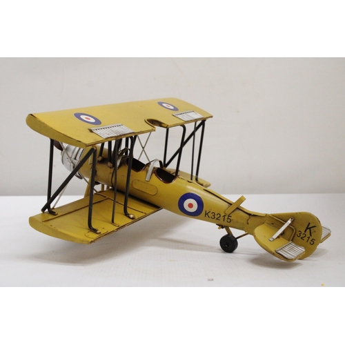 461 - A YELLOW TIN PLATE BI-PLANE