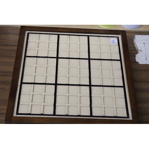 998 - A WOODEN SUDOKU GAME WITH DRAWER AND NUMBERS PLAYING CARDS, DARTS, ETC.