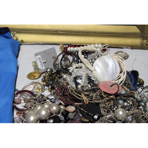 1045 - A LARGE QUANTITY OF COSTUME JEWELLERY TO INCLUDE BEADS, BANGLES, BROOCHES, EARRINGS, ETC.,