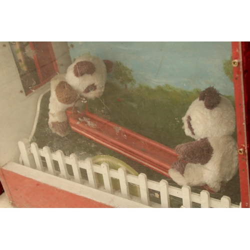 1903 - AN ORIGINAL 1960'S AUTOMATED SEESAW PANDA BEARS - VENDOR STATES IN WORKING ORDER BUT NO WARRANTY GIV... 