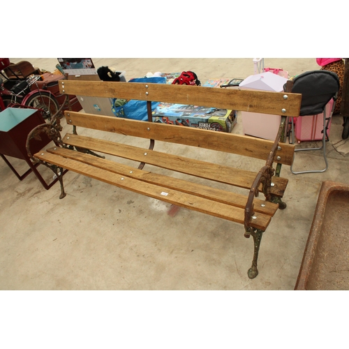 1928 - A  WOODEN SLATTED GARDEN BENCH WITH VICTORIAN BLACKBERRY AND VINE CAST BENCH ENDS