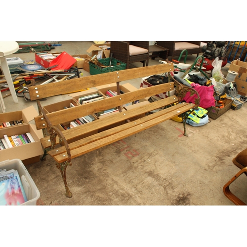 1928 - A  WOODEN SLATTED GARDEN BENCH WITH VICTORIAN BLACKBERRY AND VINE CAST BENCH ENDS