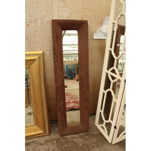 2571D - A WALL MIRROR WITH UPHOLSTERED FRAME 71.5