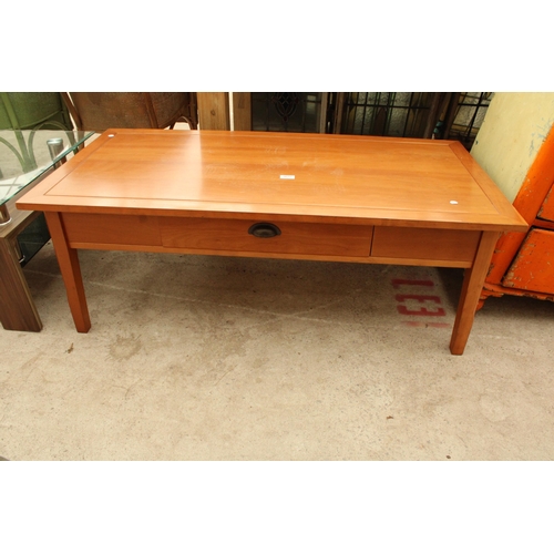 2622 - A HARDWOOD COFFEE TABLE WITH SINGLE PULL TROUGH DRAWER 48