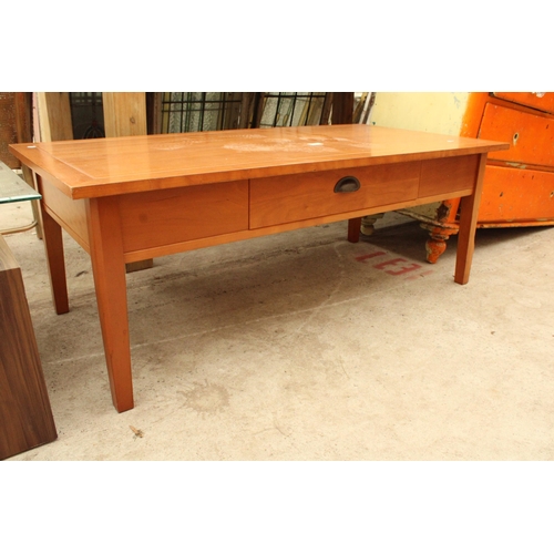 2622 - A HARDWOOD COFFEE TABLE WITH SINGLE PULL TROUGH DRAWER 48