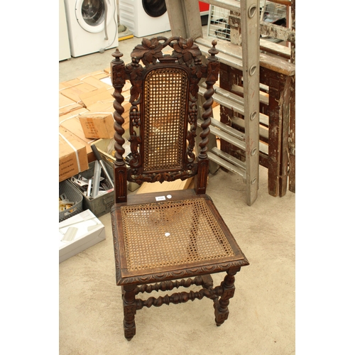 2724 - AN OAK JACOBEAN STYLE HALL CHAIR WITH CANE SEAT AND BACK, BARLEY TWIST LEGS, UPRIGHTS AND STRETCHERS