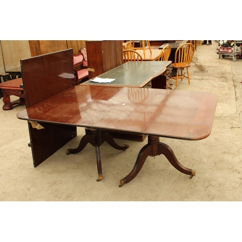 2728 - A REGENCY STYLE TWIN PEDESTAL EXTENDING DINING TABLE 70