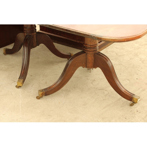 2728 - A REGENCY STYLE TWIN PEDESTAL EXTENDING DINING TABLE 70