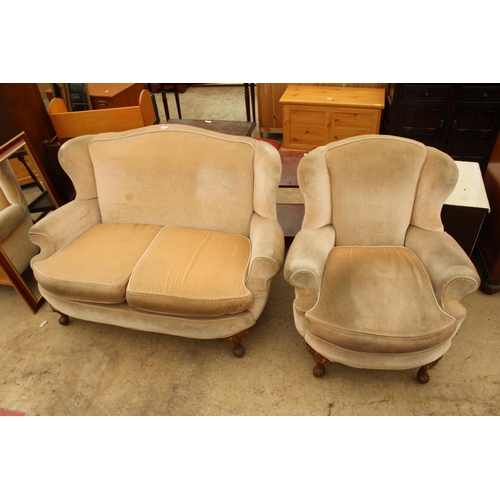 2737 - A 19TH CENTURY STYLE CURVED FRONT TWO SEATER WINGED SETTEE AND CHAIR ON CABRIOLE LEGS PARTLY PAINTED... 