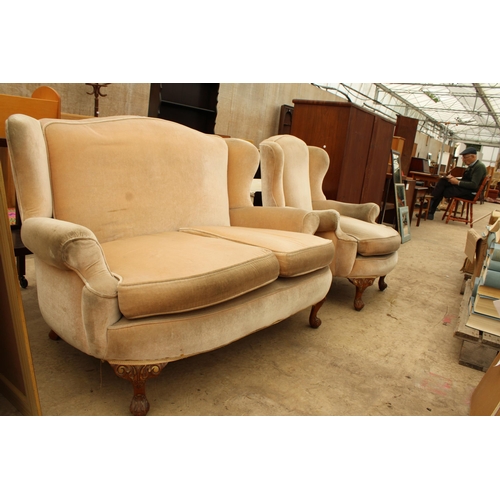 2737 - A 19TH CENTURY STYLE CURVED FRONT TWO SEATER WINGED SETTEE AND CHAIR ON CABRIOLE LEGS PARTLY PAINTED... 