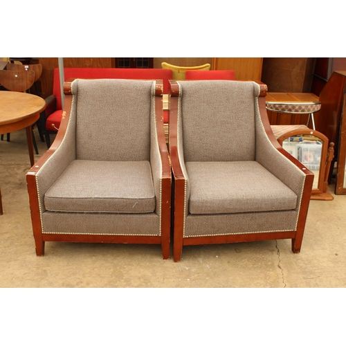 2742 - A PAIR OF SUBSTANTIAL UPHOLSTERED AND STUDDED LOUNGE CHAIRS