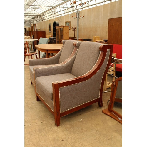 2742 - A PAIR OF SUBSTANTIAL UPHOLSTERED AND STUDDED LOUNGE CHAIRS