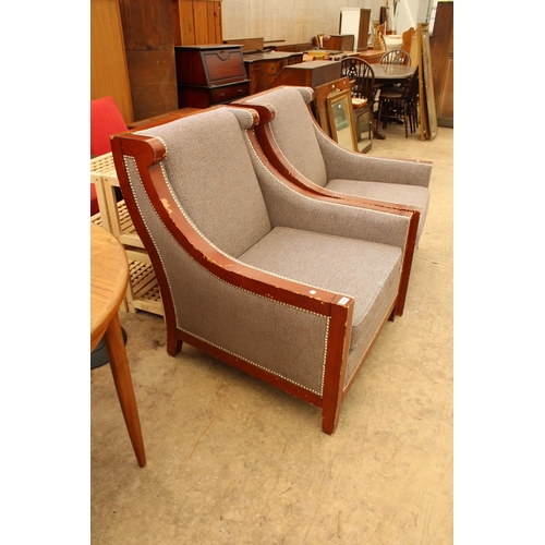 2742 - A PAIR OF SUBSTANTIAL UPHOLSTERED AND STUDDED LOUNGE CHAIRS