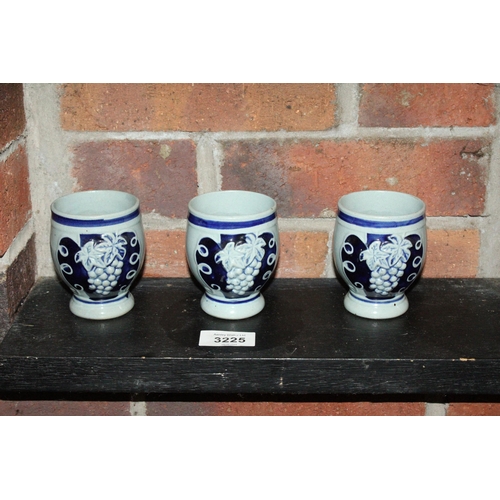 3225 - A SET OF THREE GERMAN SALT GLAZED STONEWARE GOBLETS