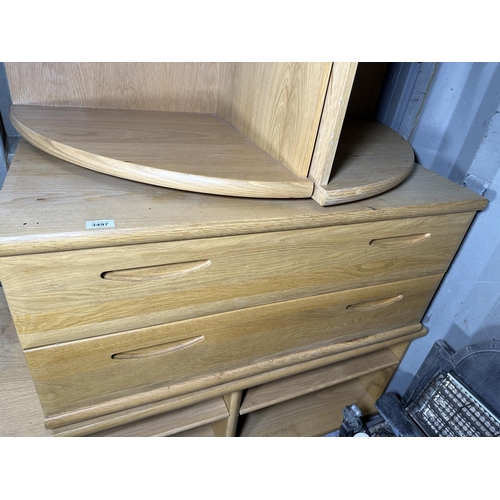 3497 - AN ASSORTMENT OF OAK EFFECT FURNITURE TO INCLUDE A CHEST OF DRAWERS AND A SHELVING UNIT ETC