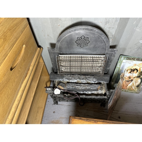 3498 - AN OAK NEST OF THREE TABLES, TWO TIN SIGNS AND AN ELECTRIC FIRE