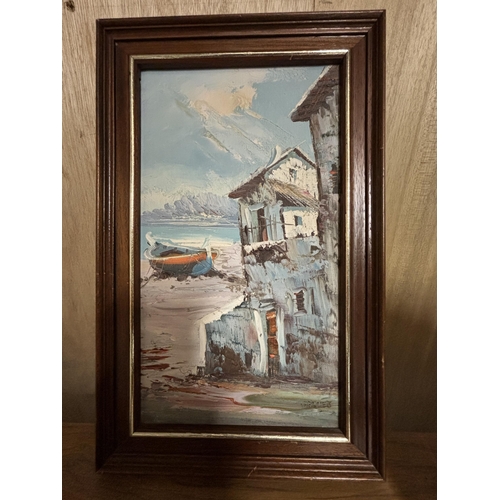 81 - A FRAMED OIL ON CANVAS OF A MEDITERRANEAN HOUSE, BOAT AND BEACH SCENE SIGNED TO LOWER RIGHT HAND COR... 