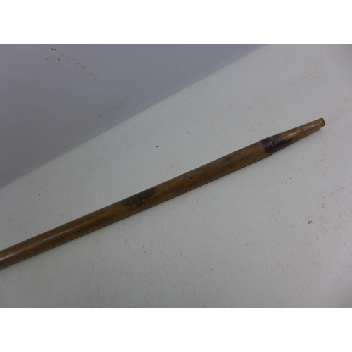 303 - AN ANTIQUE SWORD STICK, 31CM BLADE WITH WOODEN GRIP AND SCABBARD LENGTH 91CM