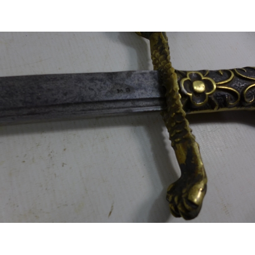 316 - A VINTAGE HUNTING SWORD AND SCABBARD, 62CM BLADE, ELABORATE CAST BRASS GRIP, LENGTH 80CM