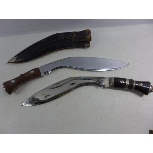 330 - A KUKRI KNIFE AND SCABBARD 29CM BLADE, LENGTH 44CM, AND FURTHER KUKRI KNIFE, LENGTH 42CM