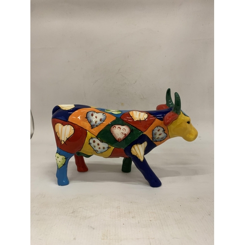 110 - A HANDPAINTED CERAMIC MONEY BOX COW