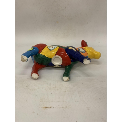 110 - A HANDPAINTED CERAMIC MONEY BOX COW