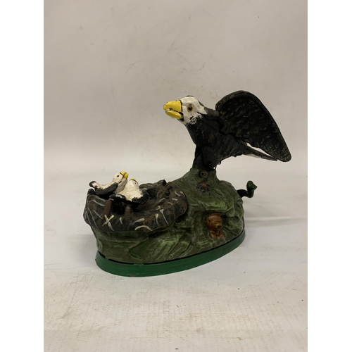 116 - A CAST IRON EAGLE AND EAGLET MECHANICAL COIN BANK