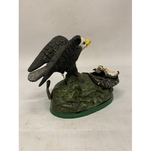 116 - A CAST IRON EAGLE AND EAGLET MECHANICAL COIN BANK