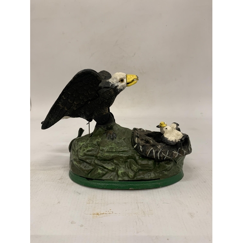 116 - A CAST IRON EAGLE AND EAGLET MECHANICAL COIN BANK