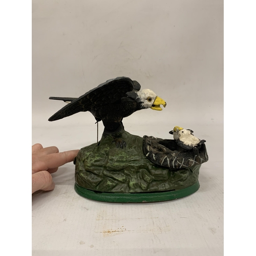 116 - A CAST IRON EAGLE AND EAGLET MECHANICAL COIN BANK