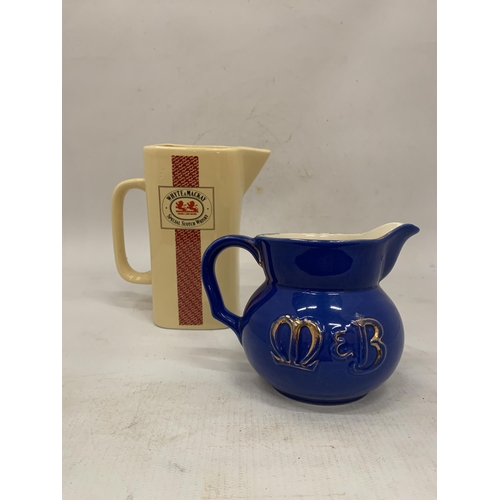 129 - A VINTAGE WADE REGICOR M & B WATER JUG AND WHYTE & MACKAY JUG