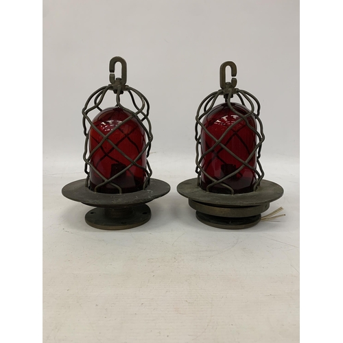 37 - A PAIR OF COASTAL NAUTICAL MARINE LIGHTS IN A BRASS CAGE