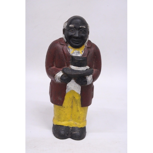 191 - A HEAVY CAST UNCLE MOSES MONEY BOX WEIGHS 3.1 KILO - APPROX 30 CM