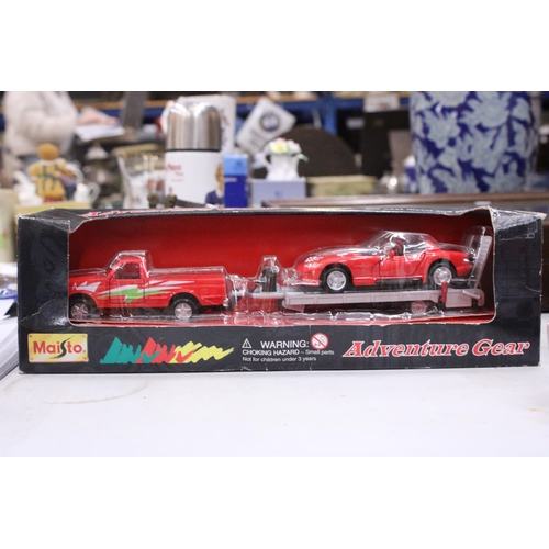 208 - THREE DIECAST BUSES AND A MAISTO VAN, TRAILER AND SPORTS CAR