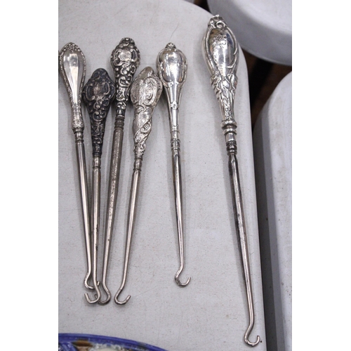 209 - A COLLECTION OF 8 SILVER HALLMARKED BUTTON HOOKS