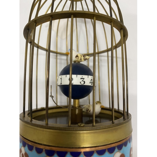 21 - A MECHANICAL BRASS BIRD CLOCK