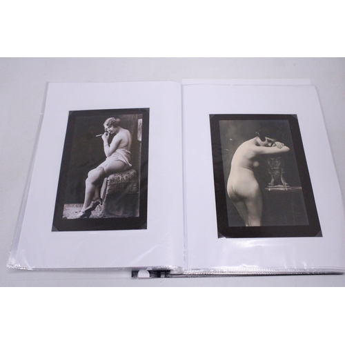 211 - A FOLDER CONTAINING 34 EROTIC FRENCH PHOTO'S PARIS STUDIO