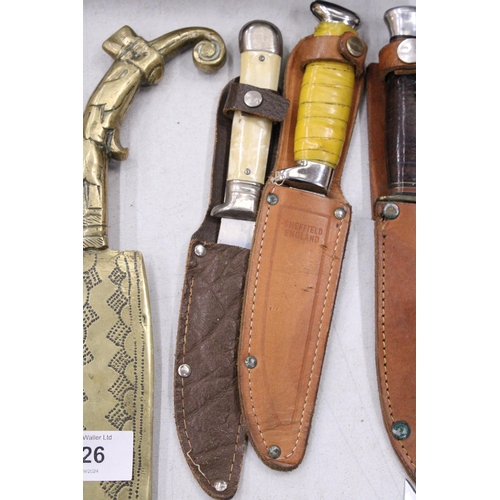 224 - THREE VINTAGE DAGGERS IN LEATHER SHEATHS