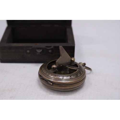 234 - A BOXED BRASS SUNDIAL AND COMPASS