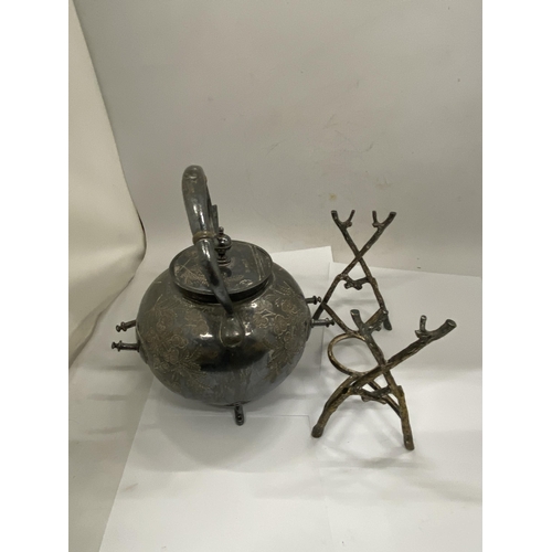 32 - A BULBOUS SILVER PLATED SPIRIT KETTLE WITH STAND