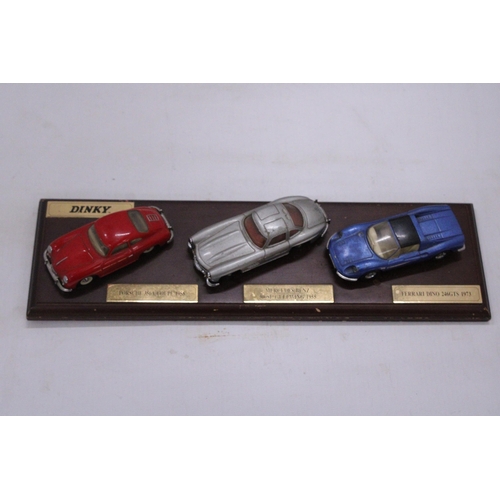 253 - A DINKY SHOP DISPLAY DIE CAST CARS TO INCLUDE A PORSCHE, MERCEDES AND A FERRARI