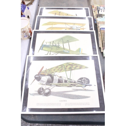 258 - A SET OF FOUR BRITISH AND GERMAN BI-PLANES AND TRI-PLANES IN METAL FRAMES - 16 X 12 INCH