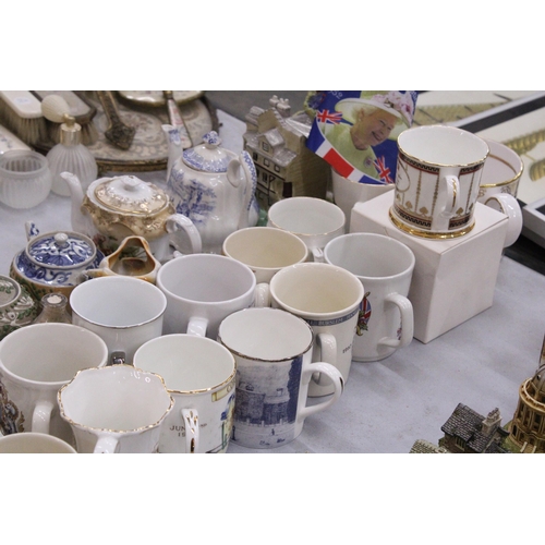 262 - A LARGE QUANTITY OF COLLECTABLES TO INCLUDE COMMEMORATIVE WARE, MOUSTACHE CUP, TEAPOTS, TRINKET POTS... 