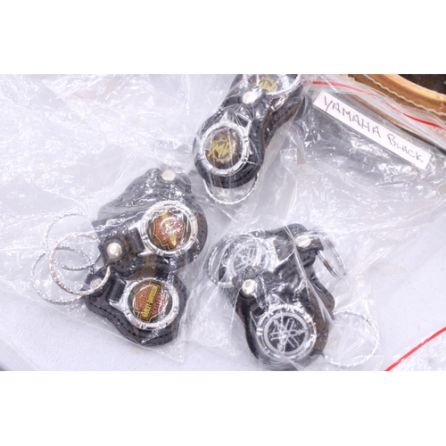 269 - A QUANTITY OF MOTORCYCLE KEYRINGS TO INCLUDE HONDA, SUZUKI, YAMAHA, TRIUMPH, ETC.,